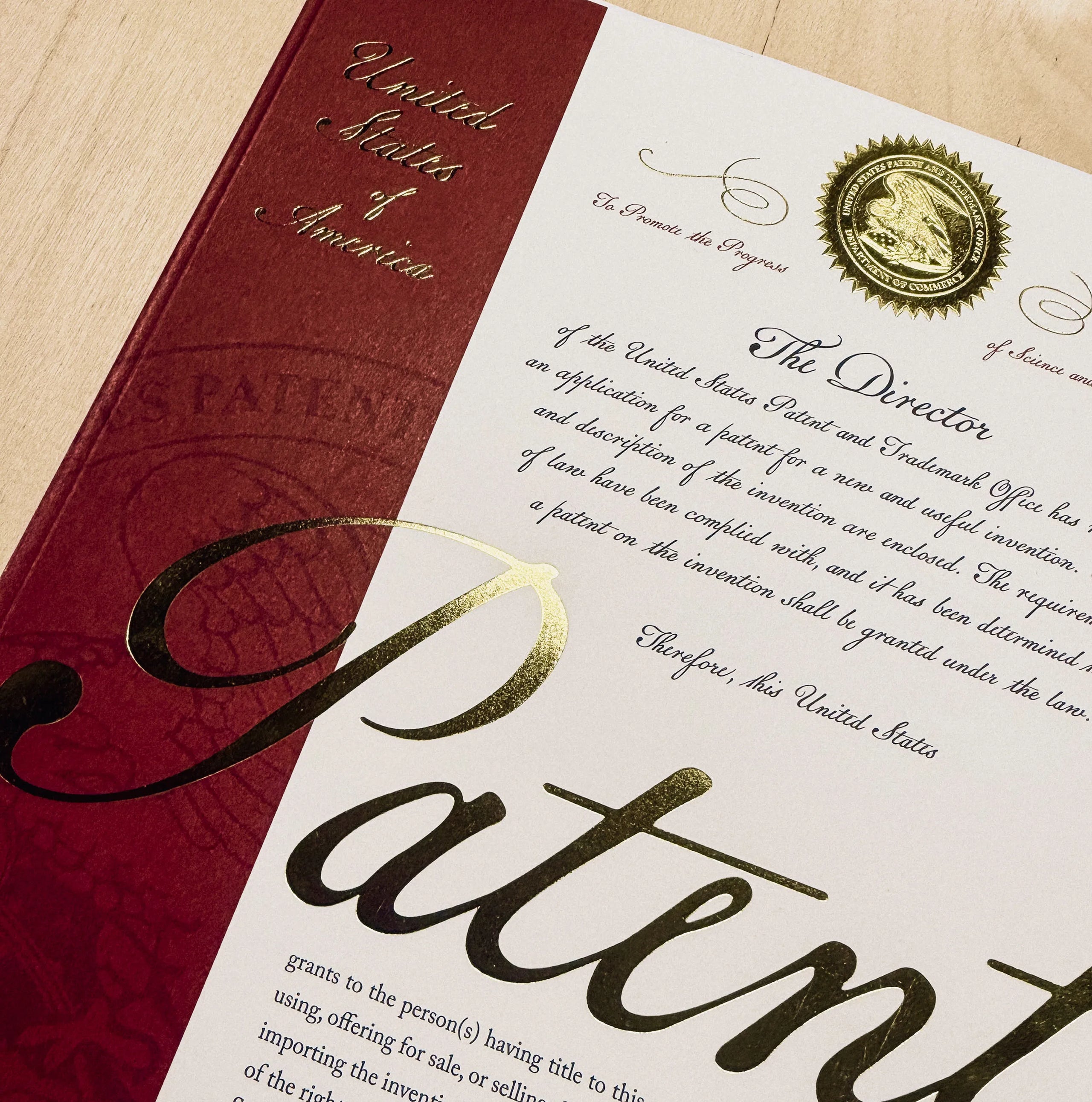 PAKAFILL patent certificate with gold embossed seal