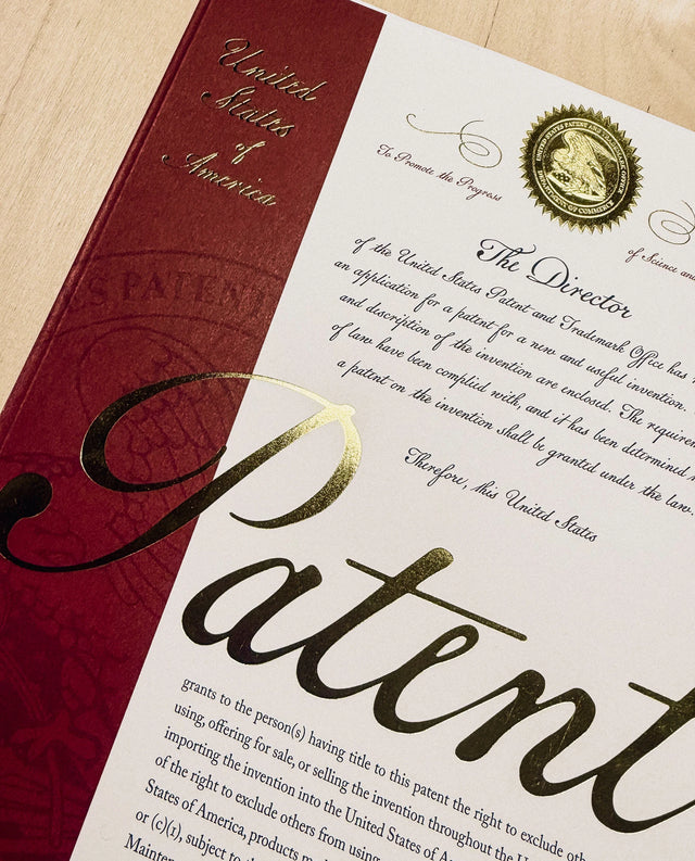 PAKAFILL patent certificate with gold seal and red spine