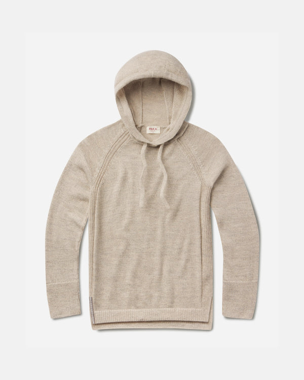 Flat lay of women’s alpaca hoodie showing lightweight knit, raglan sleeves, drawstring hood, and ribbed cuffs on white background
