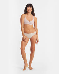 Jess is 5’7”, hips 35”, waist 26”, chest 32A and wearing a size XS.