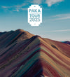 Mountain ridge with colorful layered rock formations and a centered PAKA Tour 2025 badge