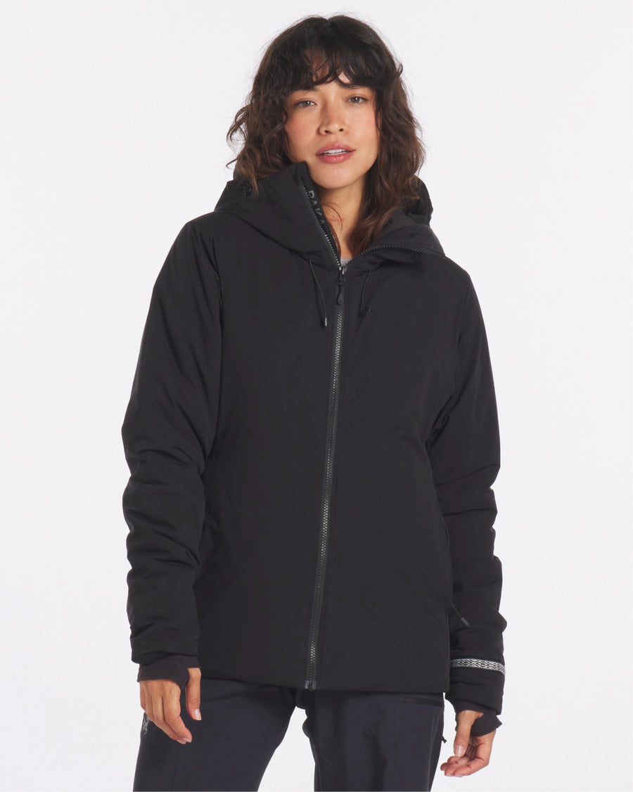 Model Wearing Apu Women's Black Parka Winter Ski Jacket with Sustainable PAKAFILL® Alpaca Insulation – PAKA Apparel