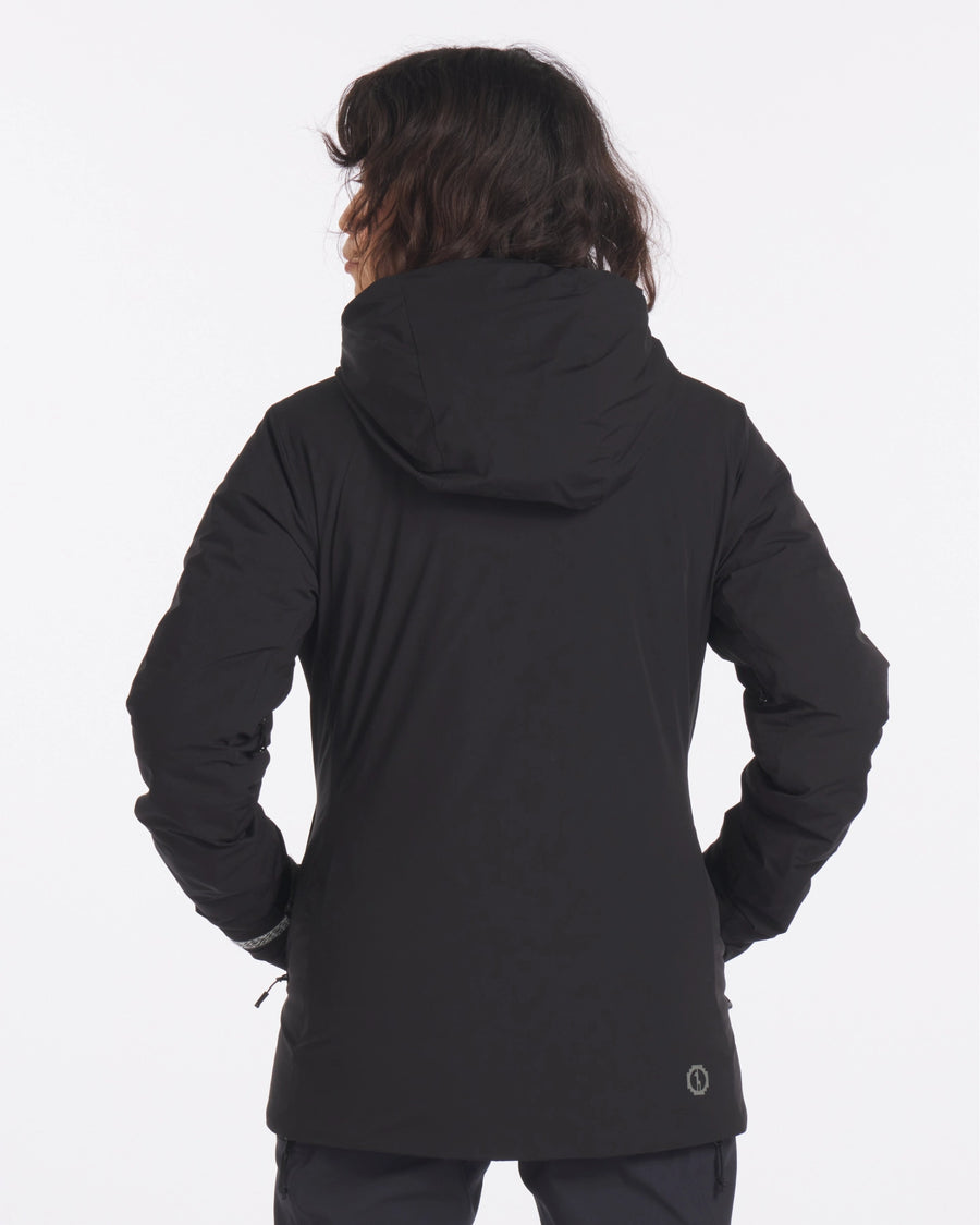 Backside of Model in Apu Women's Black Water Repellent Parka Winter Ski Jacket with Natural PAKAFILL® Insulation – PAKA Apparel