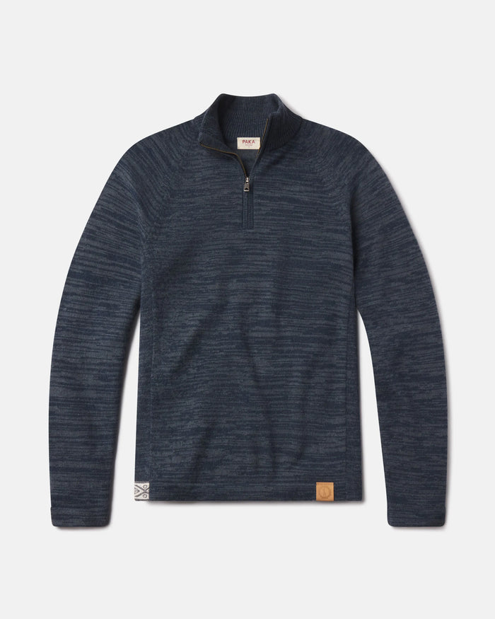 Front flat lay of The Quarter Zip alpaca wool sweater in navy heather showing quarter zip collar and leather logo on white