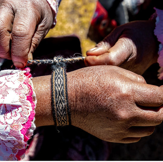 Woman's hands wearing an alpaca bracelet