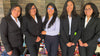 Peruvian scholarship recipients smiling together outdoors during a PAKA visit