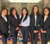 Group of young women scholars smiling and posing together during PAKA’s scholarship visit in Peru