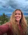 Front view of Shannon Ryan wearing the Sebastian Long Sleeve  showcasing thermoregulating alpaca fabric and slim fit outdoors