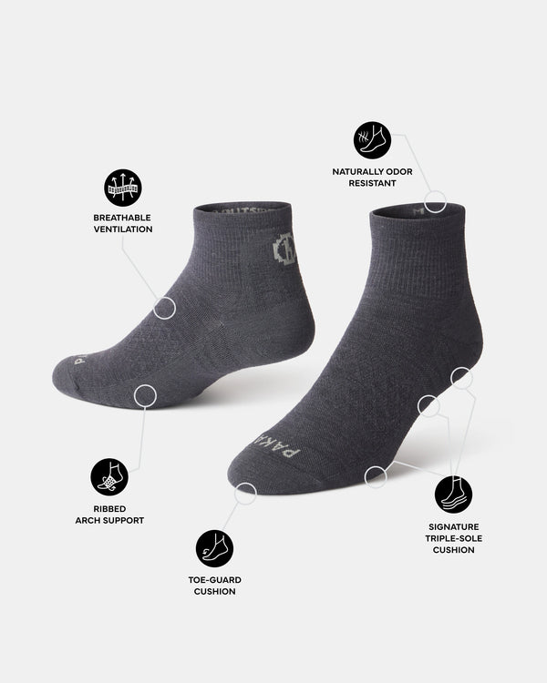 Angled view of Trail 1/4 Crew socks highlighting ventilation, arch support, toe and sole cushioning, and odor resistance
