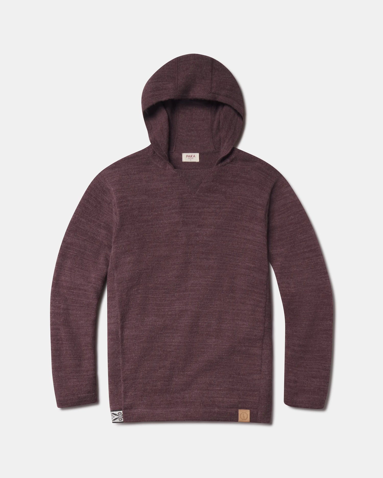 Front view of The Hoodie alpaca wool pullover with hood in raisin, showing knit texture and front hem logo on white background