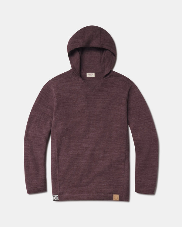 Front view of The Hoodie alpaca wool pullover with hood in raisin, showing knit texture and front hem logo on white background
