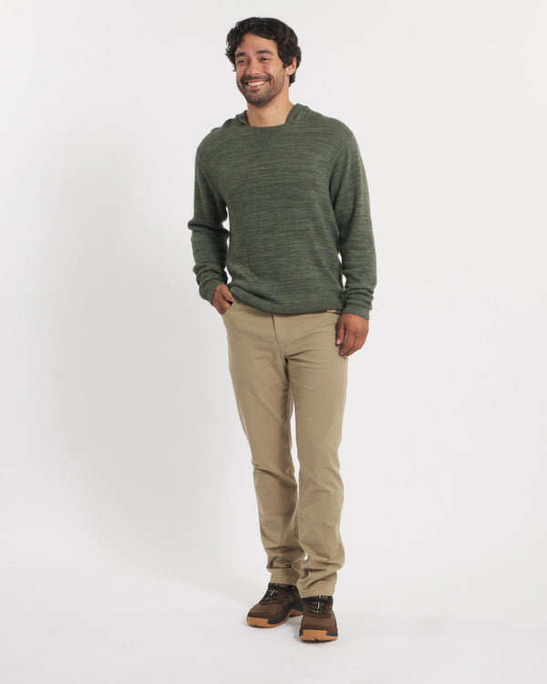 Front view of The Hoodie alpaca wool hoodie in Eucalyptus on model showing relaxed fit against white background