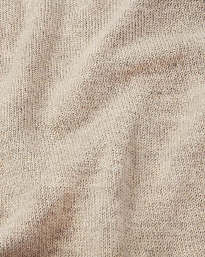Close-up of PAKA The Hoodie in Pebble fabric texture