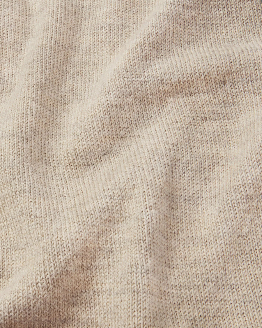 Close-up of PAKA The Hoodie in Pebble fabric texture