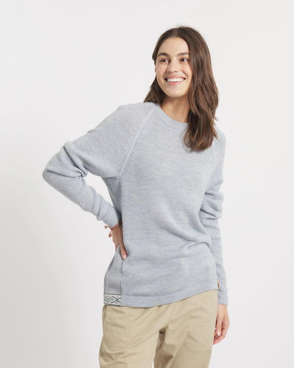 Front view of The Original Crew crewneck in sky blue on model showing raglan sleeves and relaxed fit with white background
