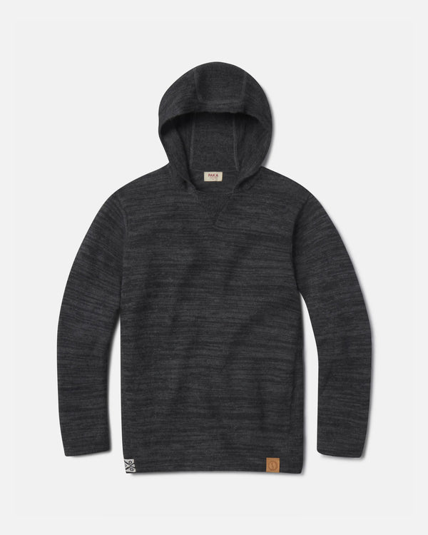 Flat lay of The Hoodie alpaca hoodie charcoal, knit texture with hood, sleeves, and logo patch on white background