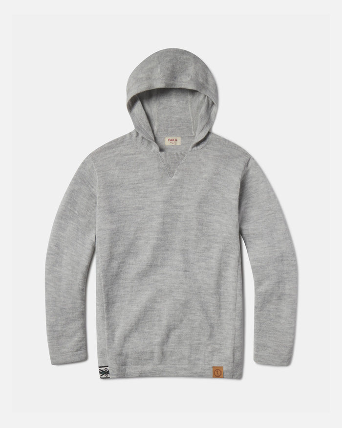 Front flat lay of The Hoodie alpaca hoodie showing soft light grey knit, attached hood, and ribbed hem on white background