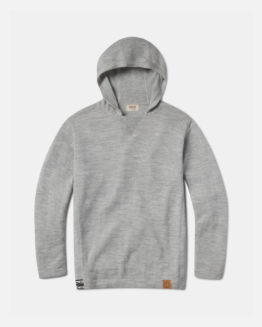Front flat lay of The Hoodie alpaca hoodie showing soft light grey knit, attached hood, and ribbed hem on white background