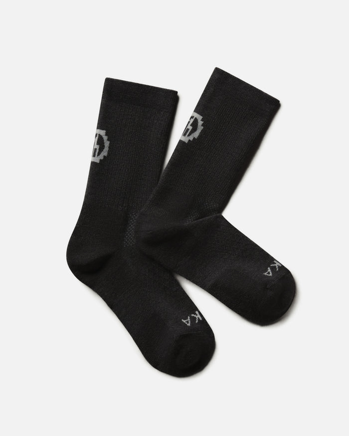 Top-down view of Trail Crew Socks showing crew height, cushioned footbed, and reinforced heel and toe in black on white background