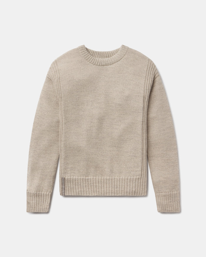 Flat lay of Women’s Original Crew sweater showing ribbed crewneck, cuffs and hem and side hem slit on light gray background