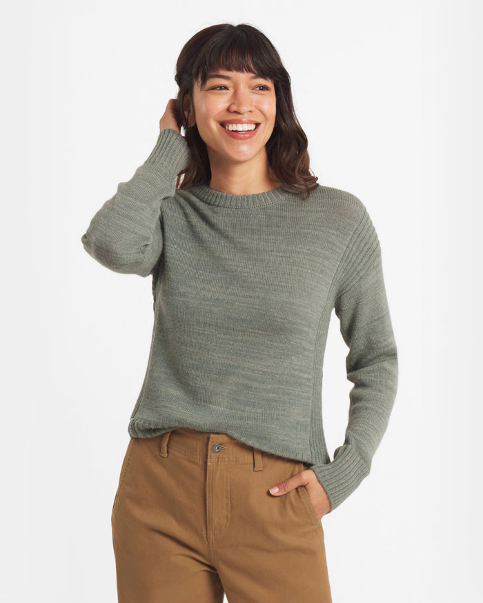 Front three-quarter view of Women’s Original Crew alpaca crewneck in willow green, relaxed fit with ribbed cuffs on white background