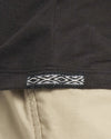 Close-Up of Inca ID on Women's Aire Alpaca Long Sleeve Hiking Shirt in Black – PAKA Apparel