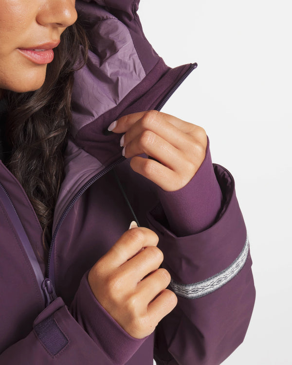 Woman Adjusting Drawstring on Amethyst / Purple Apu Parka Ski and Snowboard Jacket – PAKA Apparel