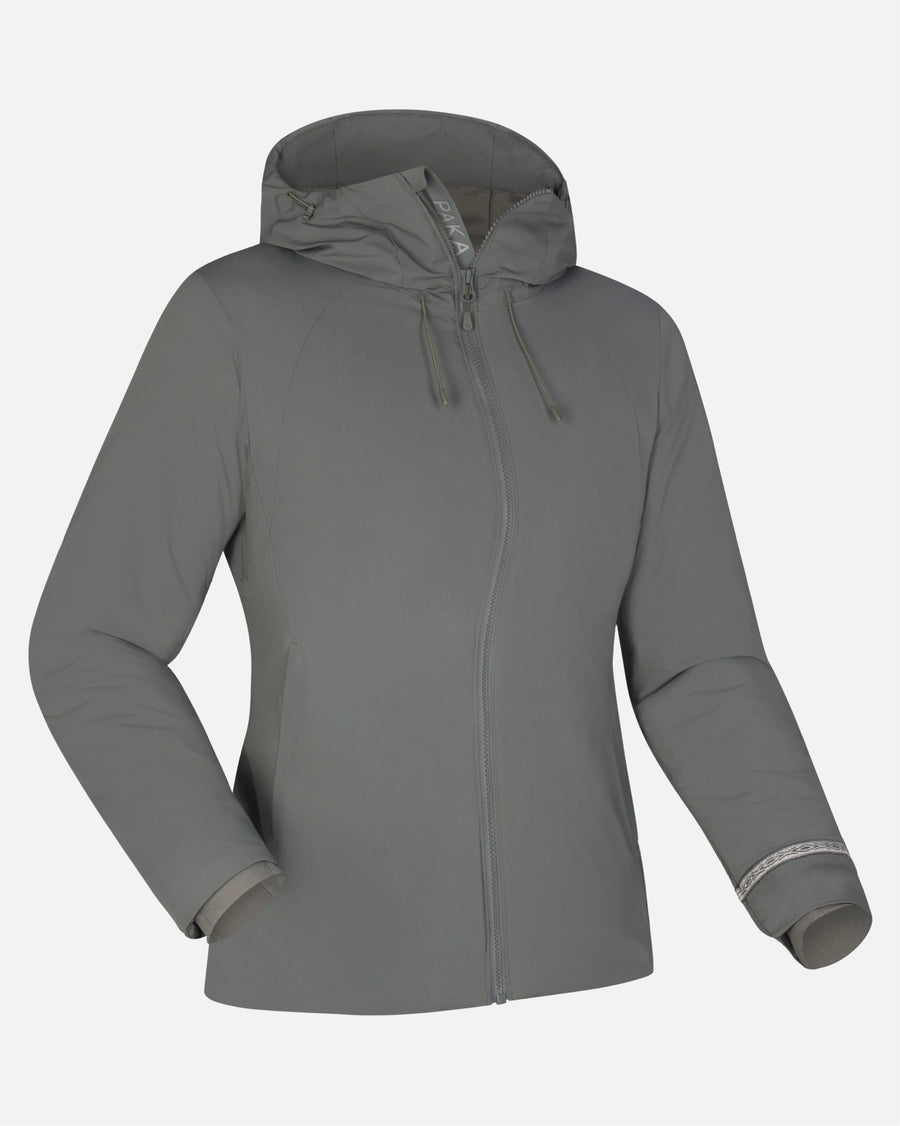 Three-quarter view of The Original Women’s Apu Parka in forage grey, showing hood, full-zip front, and side pockets on a light gray background