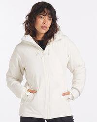 Front view of Women’s Apu Parka in ivory with hooded zip front, hand-warmer pockets, relaxed fit on white background