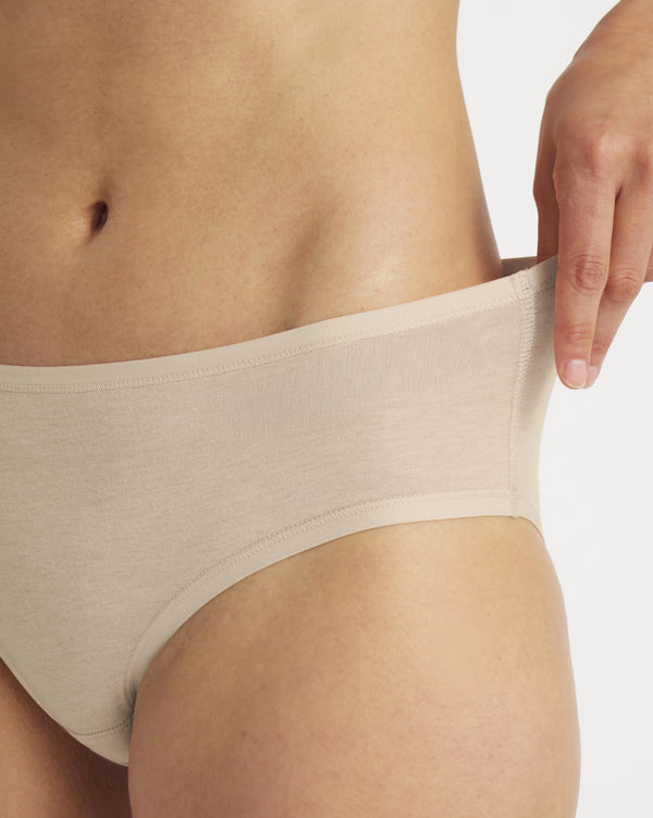 Close-up side view of Women’s Essential Mid-Rise Brief showcasing mid-rise waistband and soft stretch fabric on white background