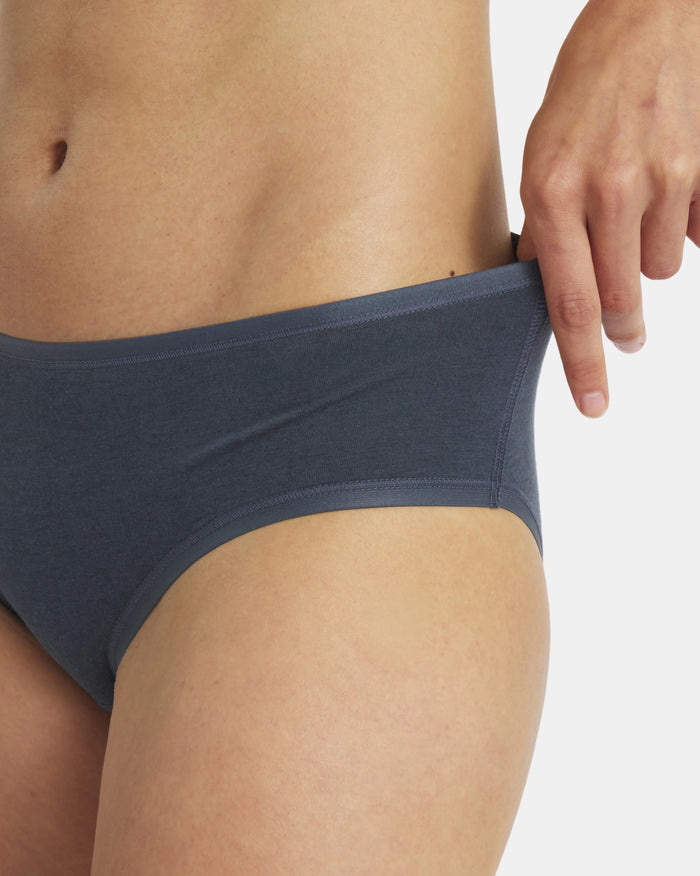 Close-up side view of Women’s Essential Mid-Rise Brief showcasing navy mid-rise waistband and smooth cotton fabric on a white background