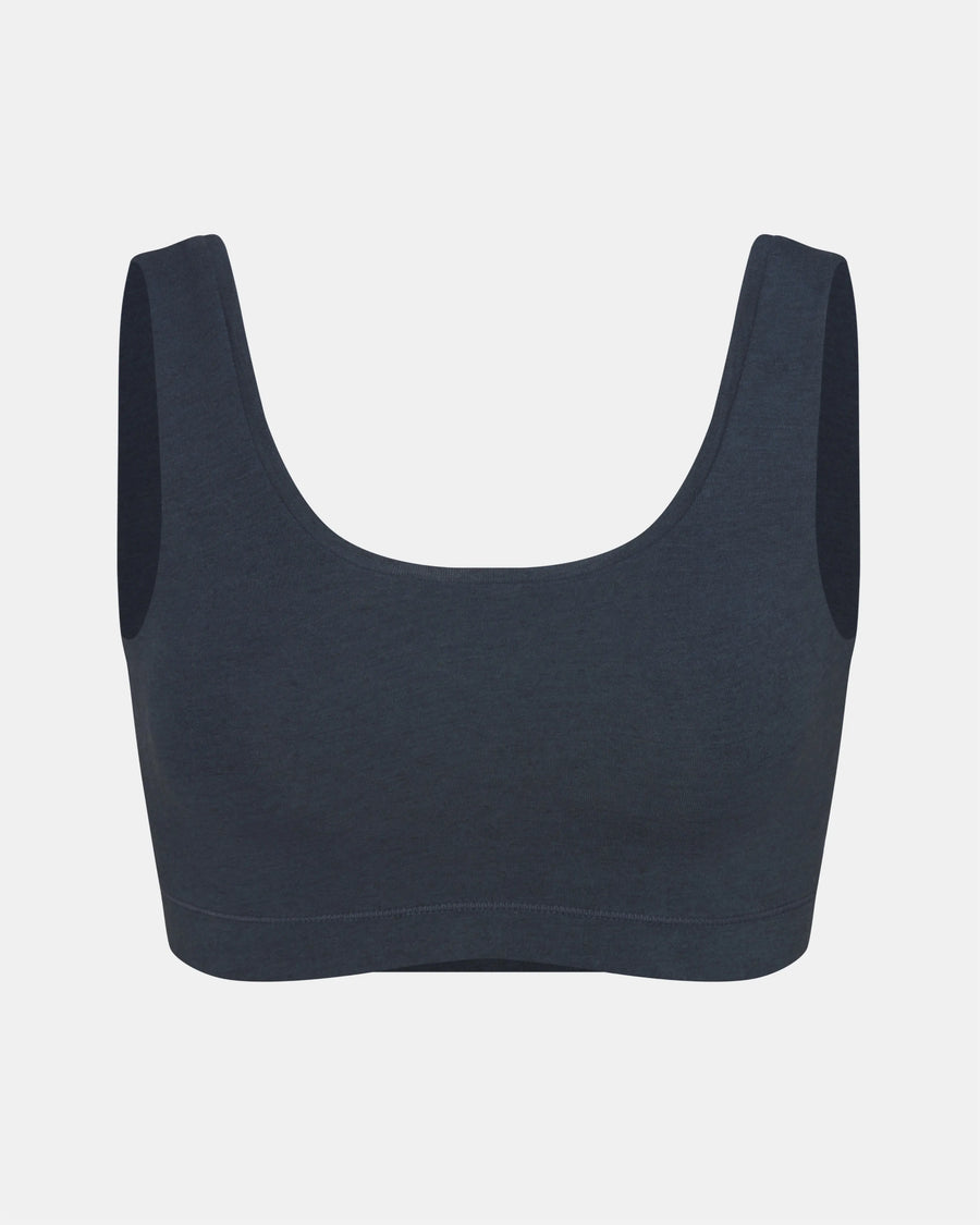 Front view of Women’s Essential Scoop Bralette in navy showing scoop neckline, wide straps and elastic underband on light gray