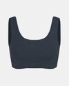 Front view of Women’s Essential Scoop Bralette in navy showing scoop neckline, wide straps and elastic underband on light gray