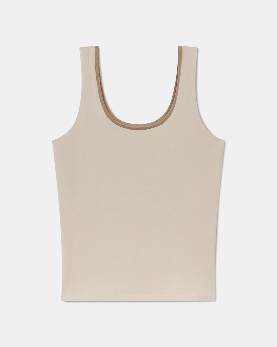 Flat lay of Women’s Essential Tank showing scoop neckline and built-in shelf bra in birch on white background