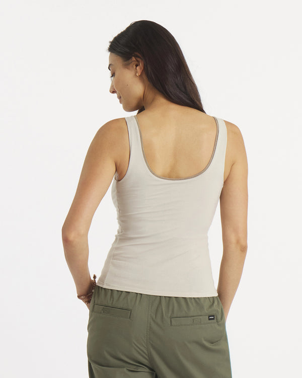 Back view of Women’s Essential Tank in birch showing scoop back, wide straps, cropped fitted torso and built-in shelf bra