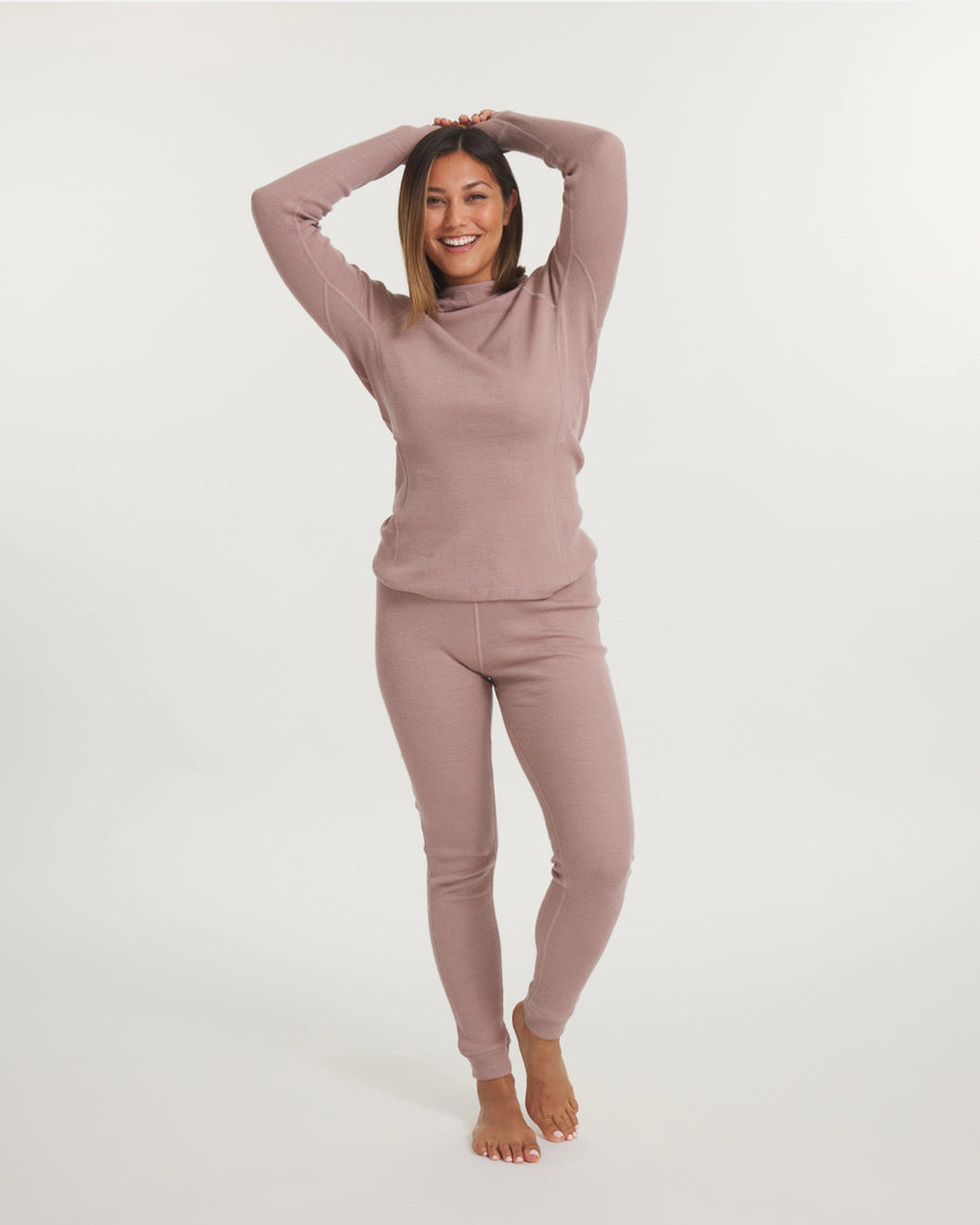 Front view of Women’s Thermal Hoodie in magnolia pink on model showing slim hooded long-sleeve fit on white background