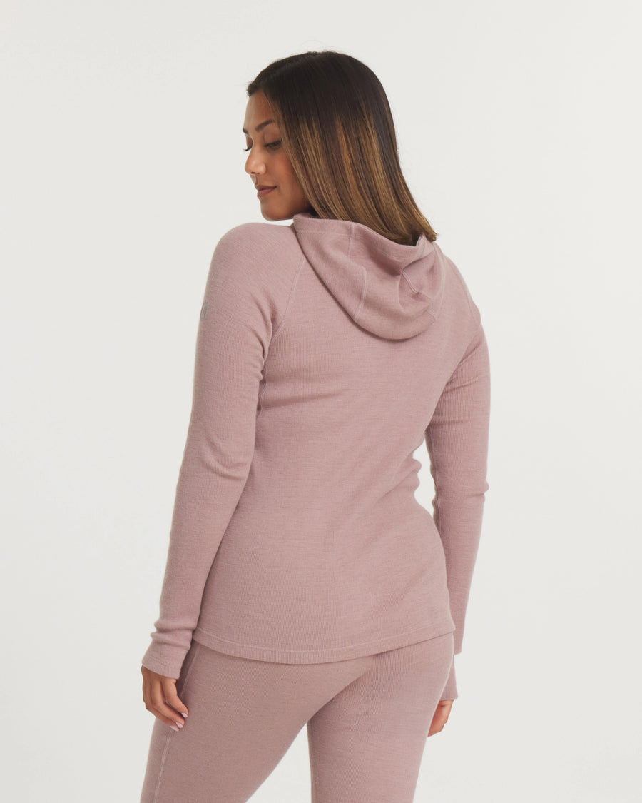 Back view of Women’s Thermal Hoodie in Magnolia pink showcasing fitted silhouette and hood with a plain white background