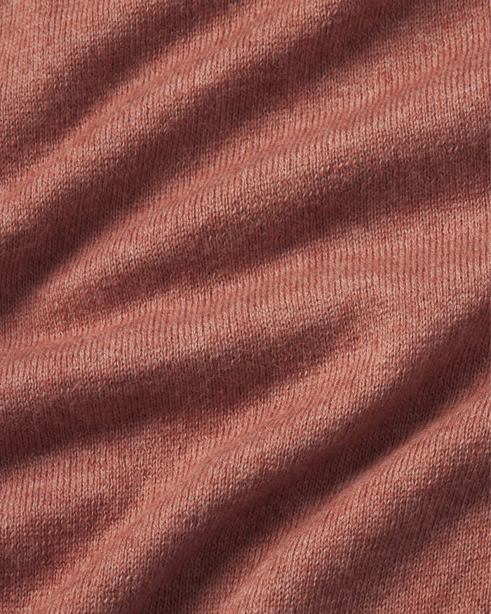 Close-up of textured red fabric with visible folds