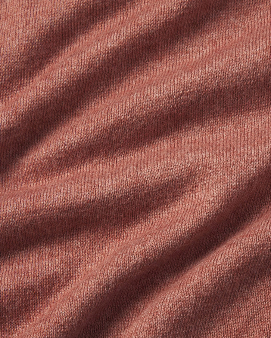 Close-up of textured red fabric with visible folds