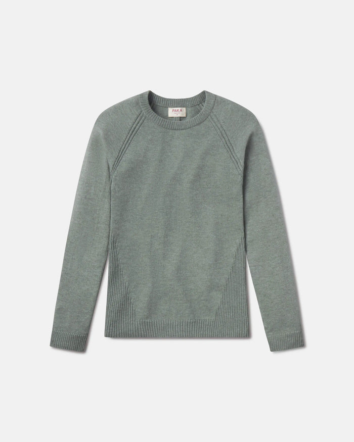 Green sweater on a light gray background
