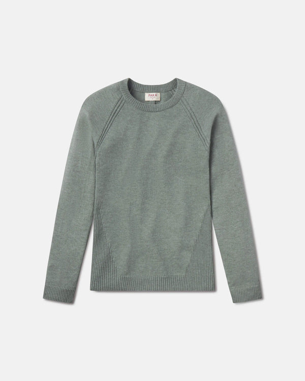 Green sweater on a light gray background