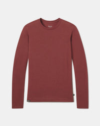Front flat lay of Women’s Aire long sleeve shirt showcasing slim, lightweight alpaca-blend knit in clay on light gray background