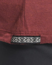 Close-Up of Inca ID on Women's Aire Lightweight Long Sleeve Hiking Shirt in Clay / Red – PAKA Apparel