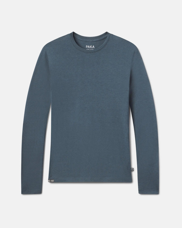 Front flat lay of Women’s Aire Long Sleeve shirt showcasing crew neck and long sleeves in navy heather on light gray background