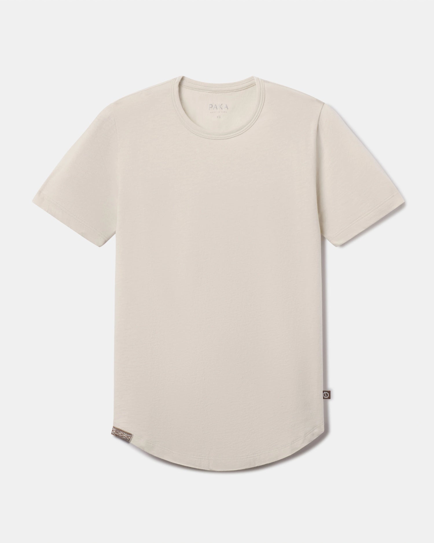 Front flat lay of Women’s Essential Tee in Bone showcasing crewneck, short sleeves, and curved hem on light background