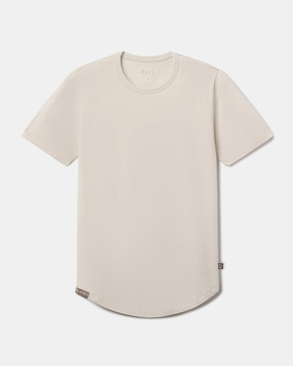 Front flat lay of Women’s Essential Tee in Bone showcasing crewneck, short sleeves, and curved hem on light background