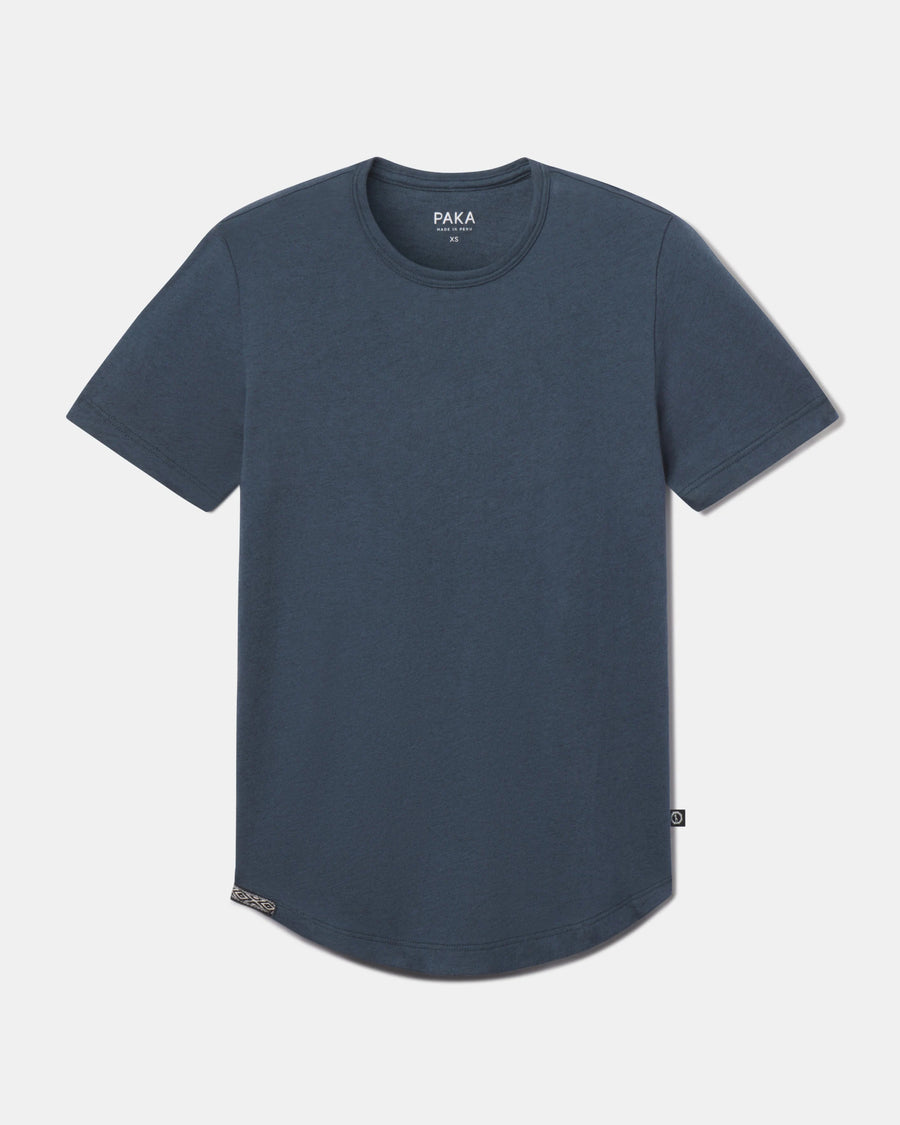 Front flat-lay of Women’s Essential Tee, navy, showing crewneck, short sleeves, ribbed neckline and curved hem on light gray background