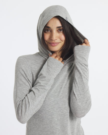 Model with Hood Up on Sol Heather Grey Women's Breathable UPF Sun Protection Hoodie – PAKA Apparel