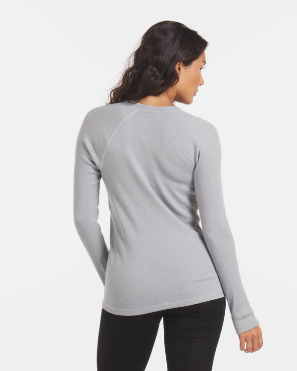 Back of Woman in Silver / Light Grey Moisture-Wicking Alpaca Wool Thermal Baselayer Top – PAKA Apparel