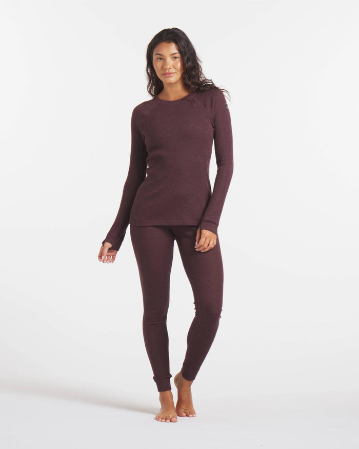 Full-body front view of Women’s 1.0 Thermal Crew showcasing rib-knit long-sleeve crew top and matching thermal leggings in uva dark purple on white background